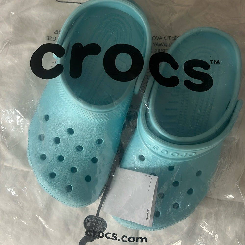Girls side 4 crocs brand new